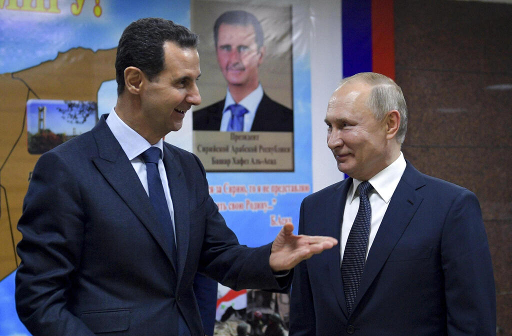  Syrian President Bashar Assad and President Vladimir Putin during their meeting in Damascus early in 2020 