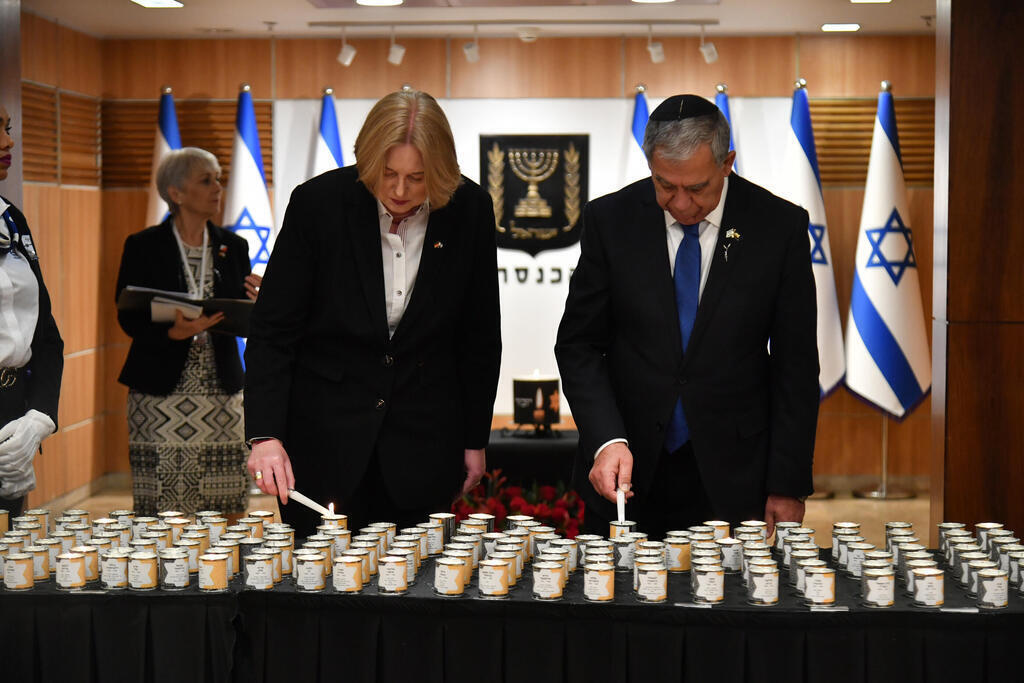 German Bundestag President Bärbel Bas and Knesset Speaker Mickey Levy at the Knesset participate in a candle-lighting ceremony in memory of the victims of the Holocaust 