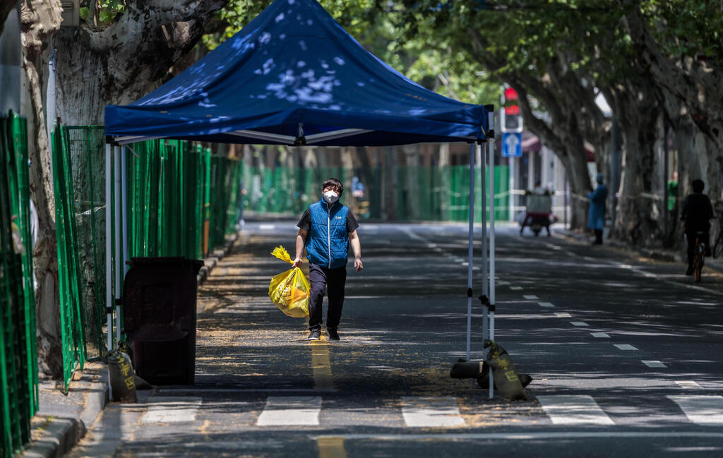 צילום: EPA סין סגר בעיר שנגחאי קורונה