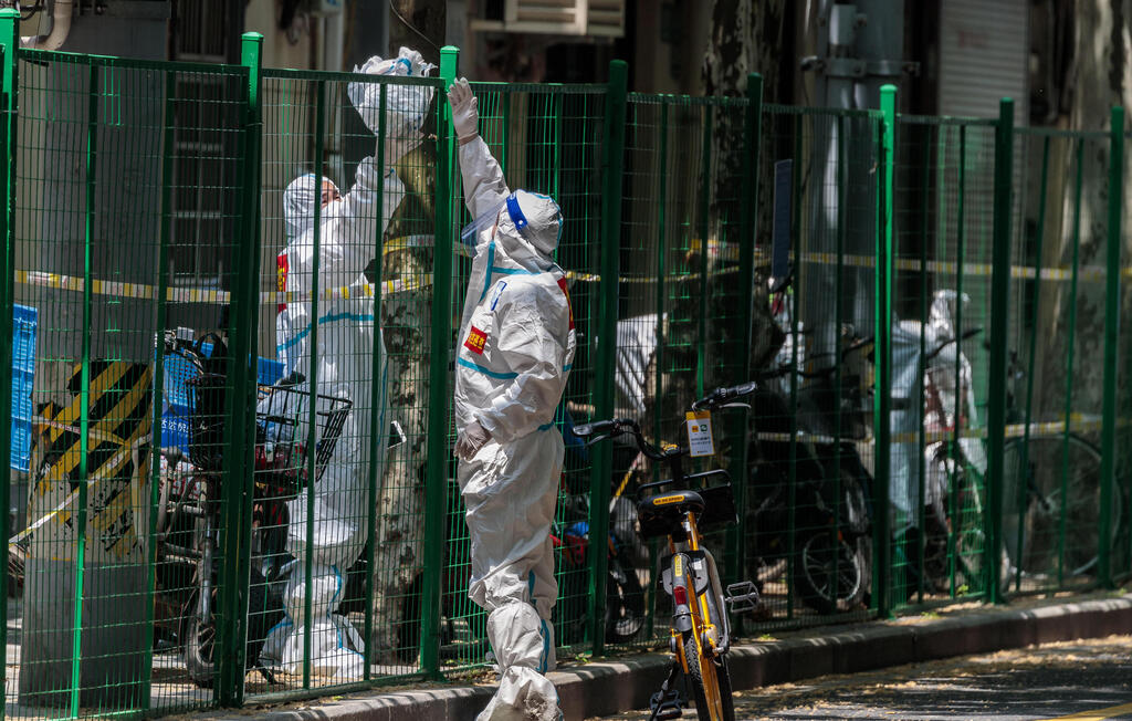 צילום: EPA סין סגר בעיר שנגחאי קורונה
