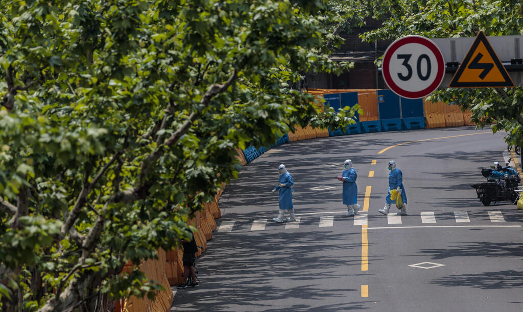 צילום: EPA סין סגר בעיר שנגחאי קורונה