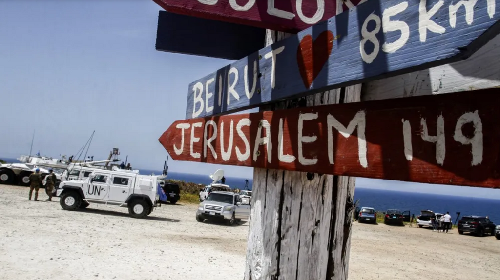United Nations peacekeeping force in Lebanon vehicles are stationed along the main road near Lebanon's southern town of Naqoura close to the border with Israel, on May 4, 2021