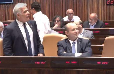 Yair Lapid and Naftali Bennett in the Knesset on Monday 