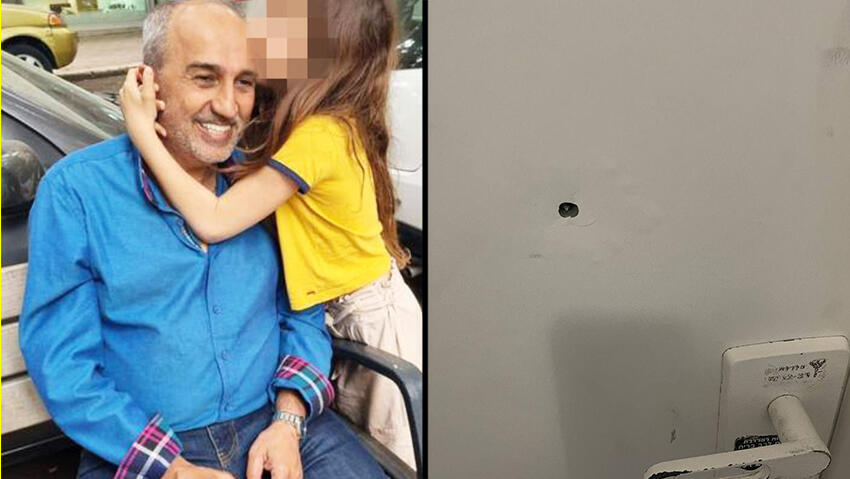 יוסי יוספיה וחור הקליע בדלת המשפחה (באדיבות המשפחה) יוסי יוספיה וחור הקליע בדלת המשפחה