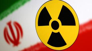 Nuclear symbol and Iran flag are seen in this illustration 