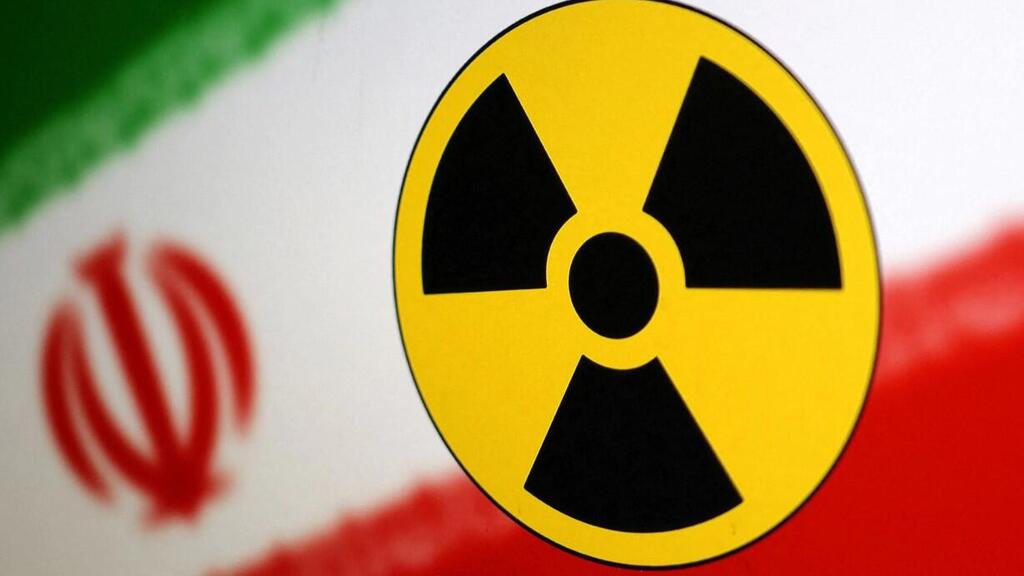 Nuclear symbol and Iran flag are seen in this illustration 