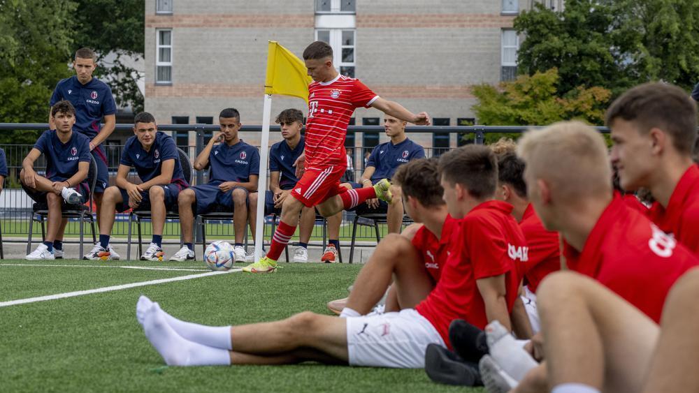 A youth players of Bayern Munich kicks the ball 