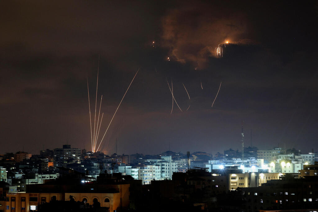 צילום: AFP שיגורים מעזה