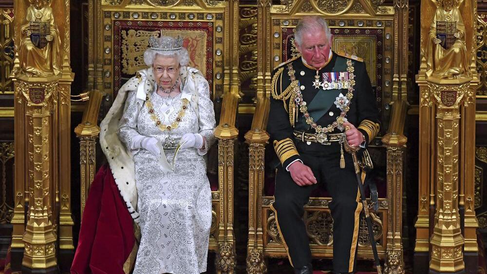 Queen Elizabeth II, with Prince Charles 