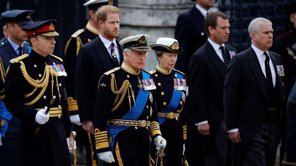 Britain's King Charles, Britain's Anne, Princess Royal, Prince Andrew, Prince Harry and Peter Phillips attend the state funeral and burial of Britain's Queen Elizabeth 