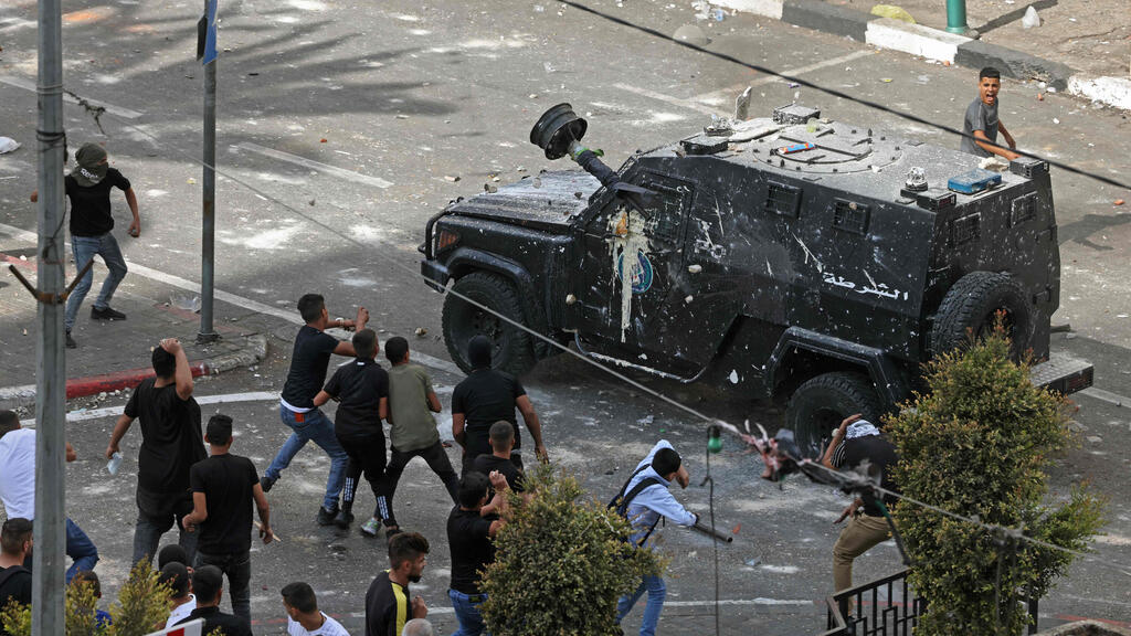Clashes between militants and Palestinian Authority security forces in Nablus (Photo: AFP) התוצאה של הפרות הסדר בשכם