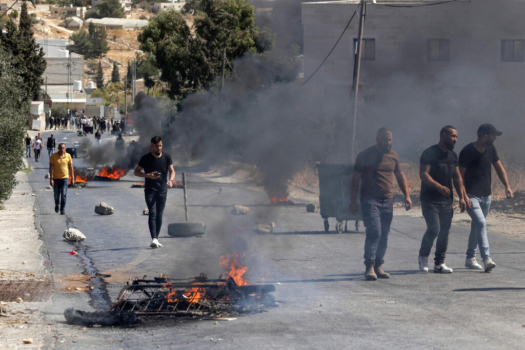 צילום: AFP עימותים ביהודה ושומרון