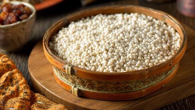 A bowl of raw organic Israeli couscous 