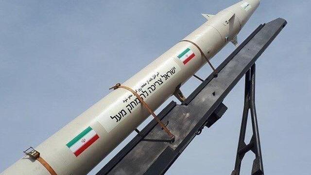 Iranian Zolfaghar missiles with Hebrew sign saying 'this is revenge for IRGC chief 