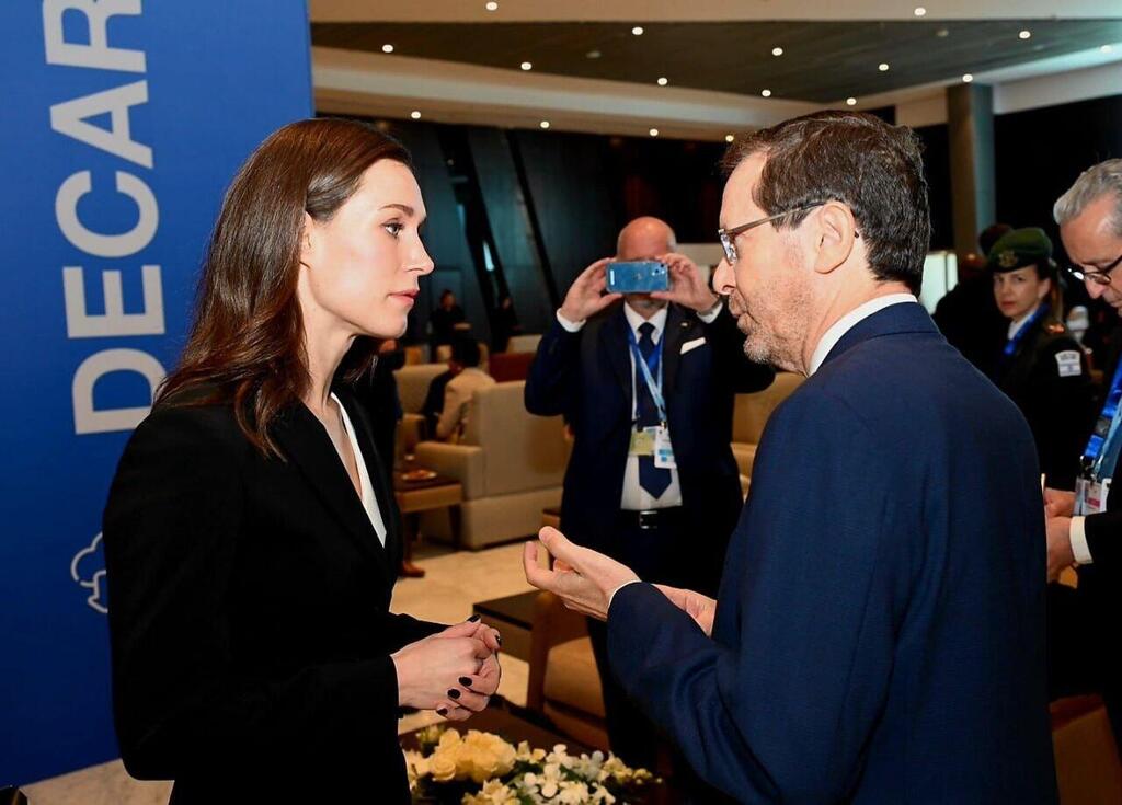 הנשיא וראש ממשלת פינלנד סאנה מרין (צילום: חיים צח, לע״מ) יצחק הרצוג וסאנה מרין