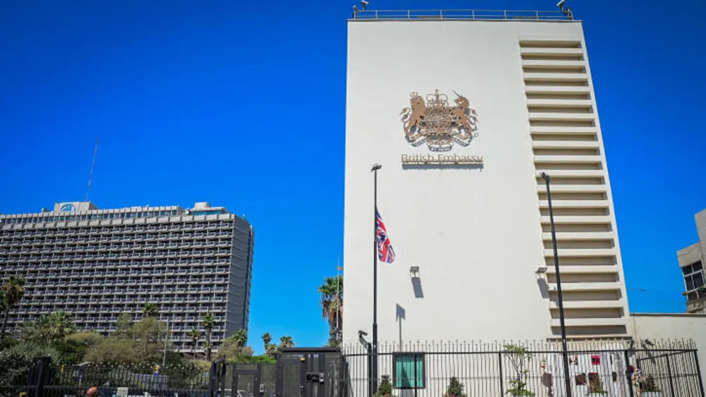 The Union Jack, the national flag of the United Kingdom, is flown at half-mast at the entrance to the British Embassy in Tel Aviv, Israel, September 9, 2022 