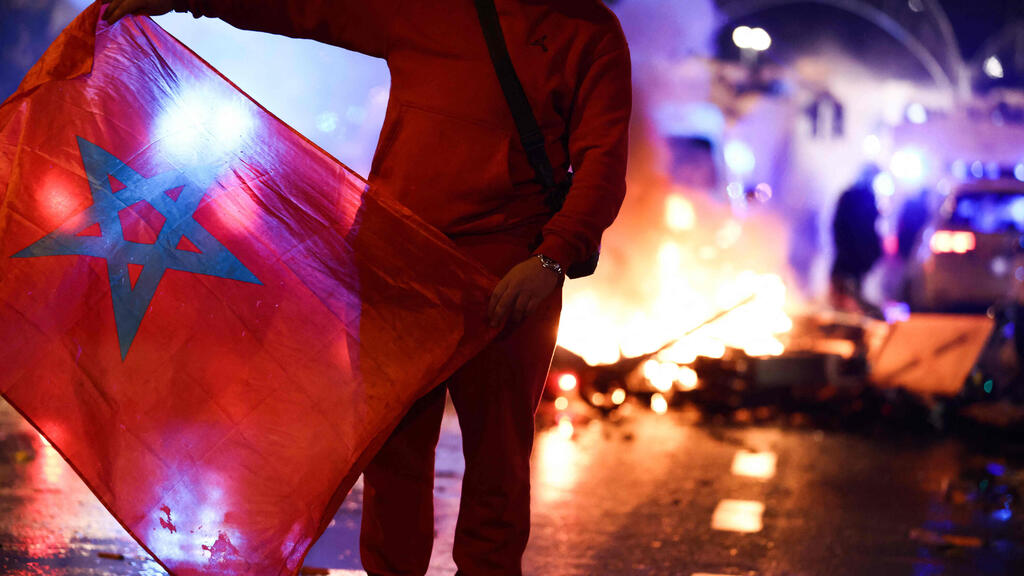 Celebration riots in Brussels, Belgium following the Moroccan victory at the World Cup (Photo: AFP) מהומות ב בריסל בלגיה אחרי ניצחון של נבחרת מרוקו על פני הנבחרת הבלגית ב מונדיאל