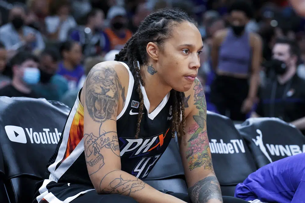 Phoenix Mercury center Brittney Griner sits during the first half of Game 2 of basketball's WNBA Finals against the Chicago Sky, Wednesday, Oct. 13, 2021, in Phoenix 