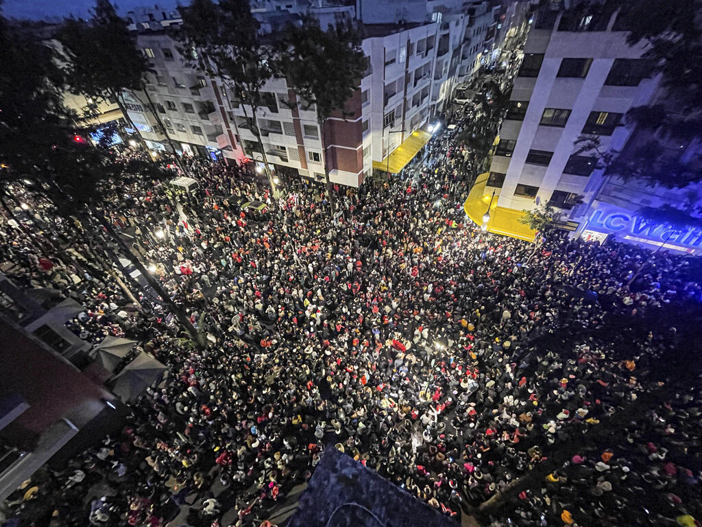 חגיגות במרוקו אחרי הניצחון על פורטוגל, בשבת (צילום: AP) חגיגות במרוקו אחרי הניצחון על פורטוגל