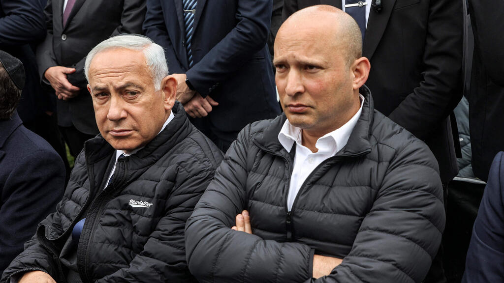 בינימין נתניהו ונפתלי בנט (צילום: AFP) בינימין נתניהו ונפתלי בנט בהלוויתו של הרב חיים דרוקמן