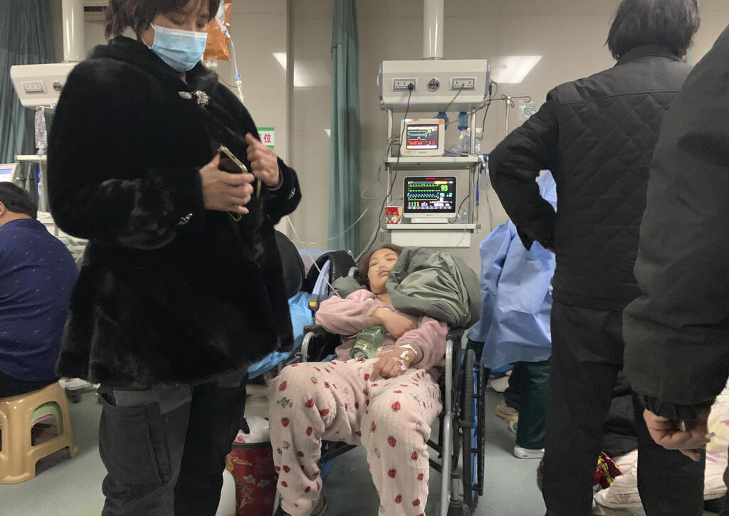 צילום: AP בית חולים במחוז חביי ב סין 22 בדצמבר בצל התפרצות קורונה 21 בדצמבר