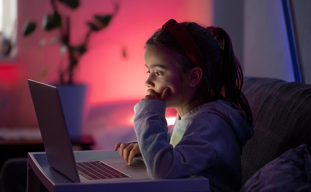 little girl playing video games