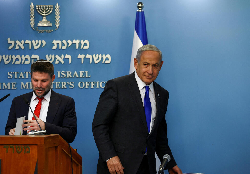 Prime Minister Benjamin Netanyahu and Finance Minister Bezalel Smotrich hold a news conference to present their plan for dealing with price increases in Israel's economy at the Prime Minister's office in Jerusalem, January 11, 2023 