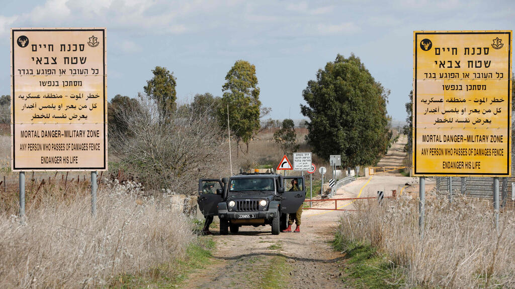 גבול סוריה. אל-עבדאללה נעצר ליד הגדר (צילום: AFP) גבול סוריה