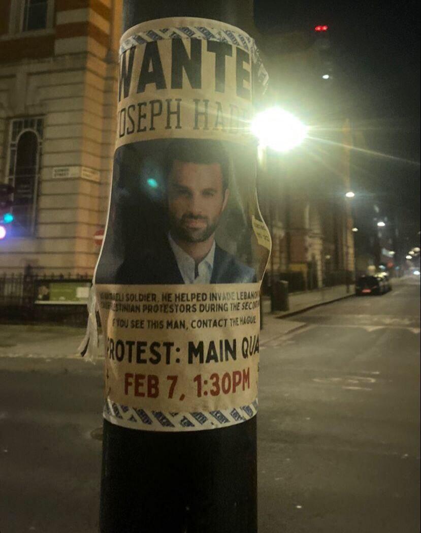 Sign advertising anti-Israel protest with ‘wanted’ sign depicting Arab Israeli activist Yoseph Haddad’s face 