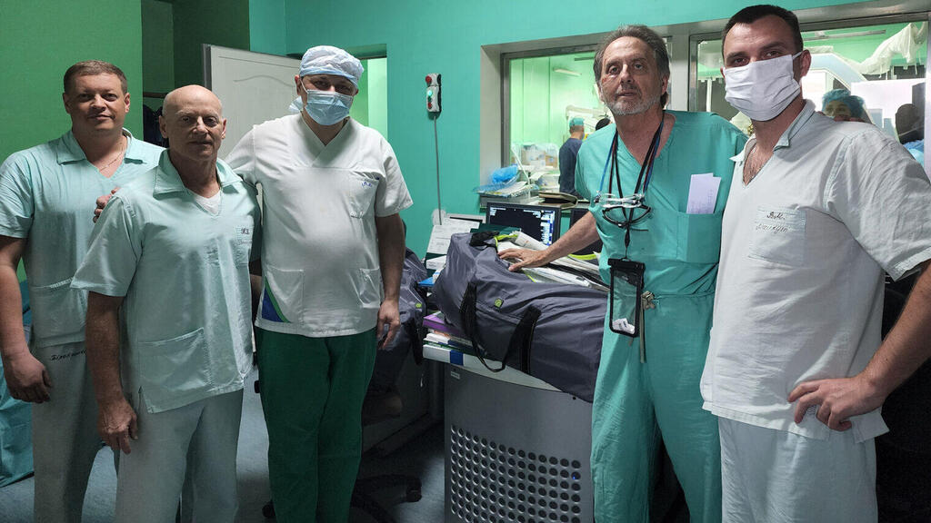 Enrique Ginzburg, second from right, is shown with Ukrainian doctors in Lviv (Photo: Courtesy of Ginzburg) Enrique Ginzburg, second from right, is shown with Ukrainian doctors in Lviv