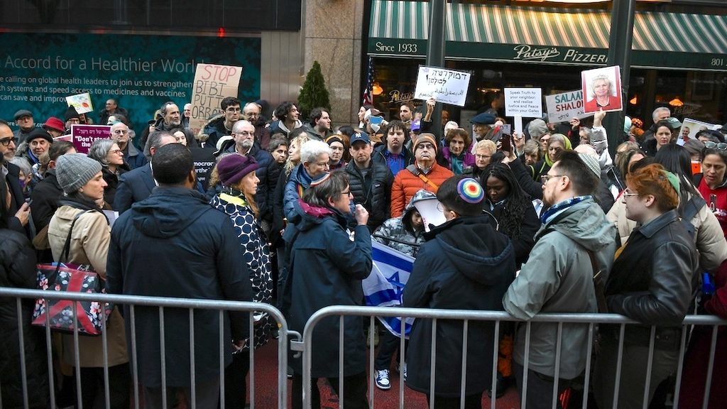 Hundreds protest the proposed Israeli court reform outside the Israeli consulate in New York City on Feb. 21, 2022 
