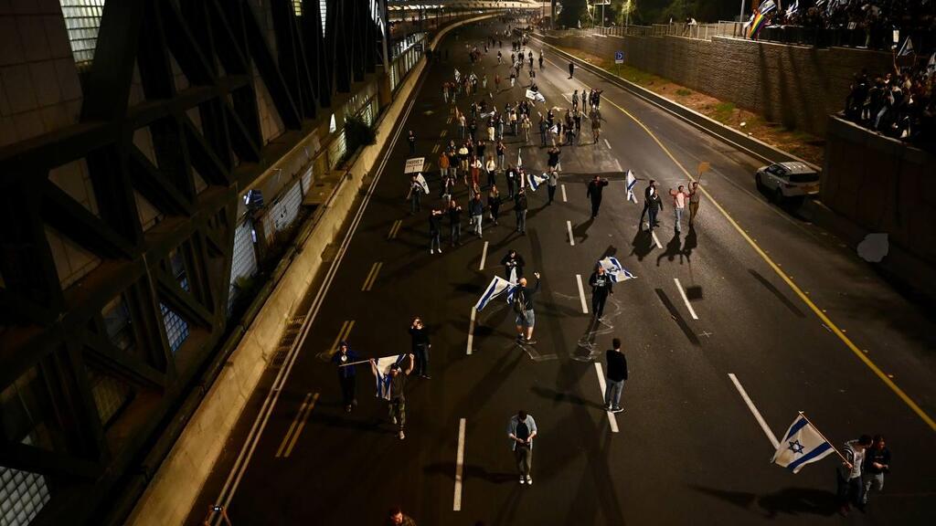 צילום: נדב אבס מפגינים חוסמים את איילון דרום לאחר ההפגנה בקפלן