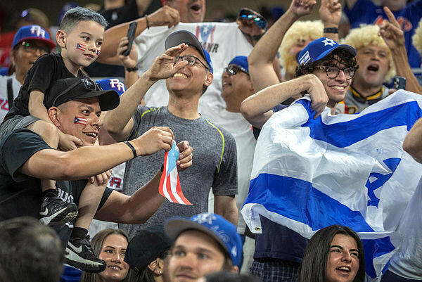 Fans react during the 2023 World Baseball Classic Pool D match between Puerto Rico and Israel at loanDepot park baseball stadium in Miami, Florida, USA, 13 March 2023