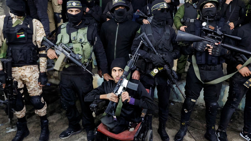 Palestinian gunmen take part in a memorial service, in Jenin refugee camp the Israeli-occupied West Bank, March 3, 2023 