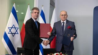 The Israeli and Polish foreign ministers,Eli cohen Zbigniew Rau