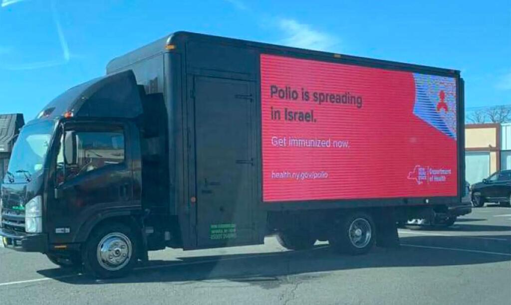 New York State truck featuring an advertisement - "Polio Spreads in Israel"