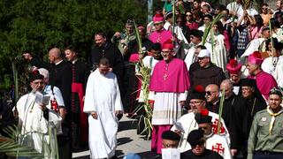 Latin Patriarch of Jerusalem Pierbattista Pizzaballa leads a Palm Sunday procession on the Mount of Olives in Jerusalem 