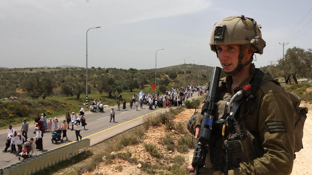הצעדה לאביתר בשבוע שעבר (צילום: AFP) הצעדה באביתר
