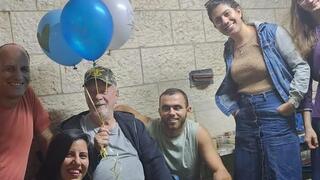 Survivor Ran Nezer enjoying a visit
