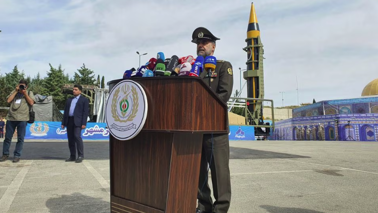 Iran's Defense Minister Brigadier General Mohammad-Reza Ashtiani speaks in a press conference during the unveiling of a new surface-to-surface 4th generation Khorramshahr ballistic missile called Khaibar in Tehran, Iran, May 25, 2023 