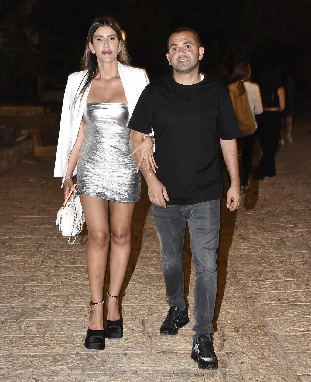 האישה והנעל ב-5,900 שקל שנשפכה עליה שעווה. עינב בובליל ובעלה אלי (צילום: אמיר מאירי) עינב בובליל אירוע ארגניה