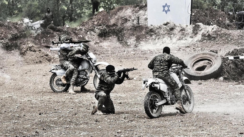 כוח רדואן בעימות. חיזבאללה פורש את לוחמיו המובחרים מול ישראל (צילום: AFP) כוח רדואן בעימות. חיזבאללה פורש את לוחמיו המובחרים מול ישראל