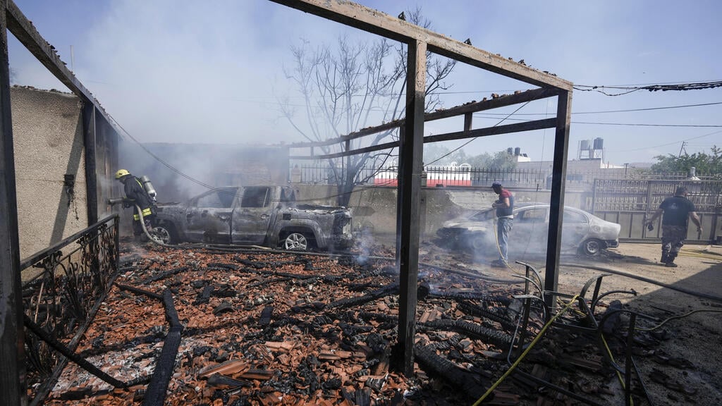 "לא נוכל לעמוד מנגד כשיהודים פועלים בצורה המזכירה את הפורעים בבני עמנו". תיעוד לאחר הפרעות בתורמוס עיא (AP) AP_Israel_Palestinians_08995--a4f0d656450.jpg