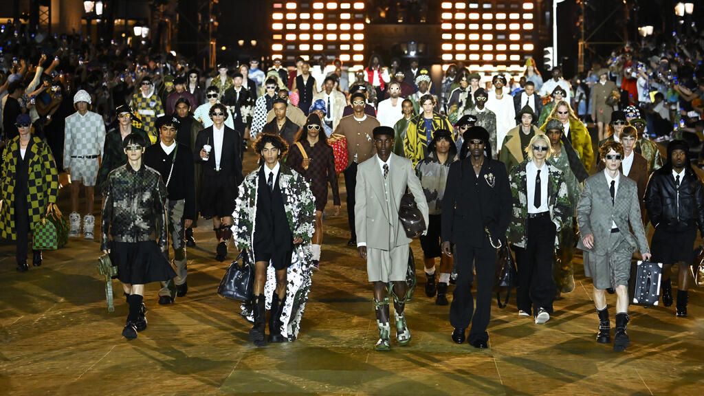 A model wears a creation by Kim Jones as part of Louis Vuitton Men's  fashion Spring Summer 2012 collection presented during the Paris Men's  Fashion Week, in Paris, France, June 23, 2011.