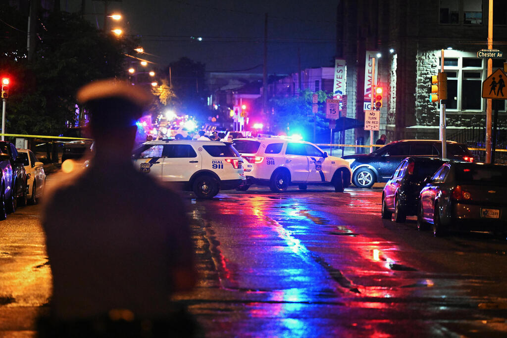 צילום: Drew Hallowell / GETTY IMAGES NORTH AMERICA / AFP ארה"ב טבח ירי ב פילדלפיה