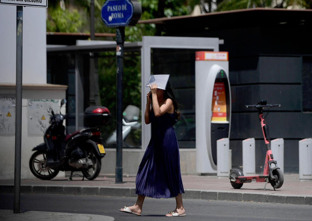 צילום: CRISTINA QUICLER / AFP גל חום דרום אירופה סביליה ספרד