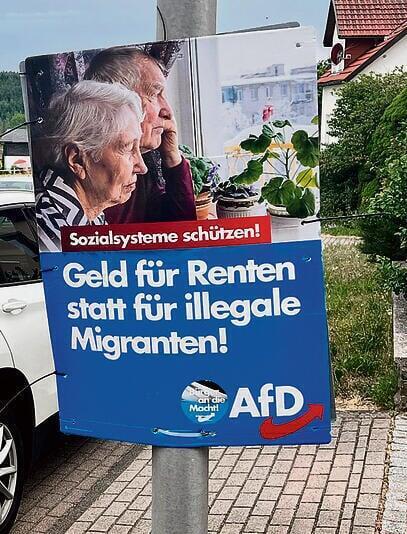 'Your pension money went to immigrants'; Election sign of Alternative for Germany 