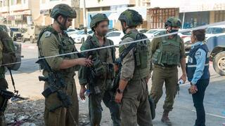  כוחות צה"ל ומפקדי אוגדת יהודה ושומרון מזירת הפיגוע חווארה