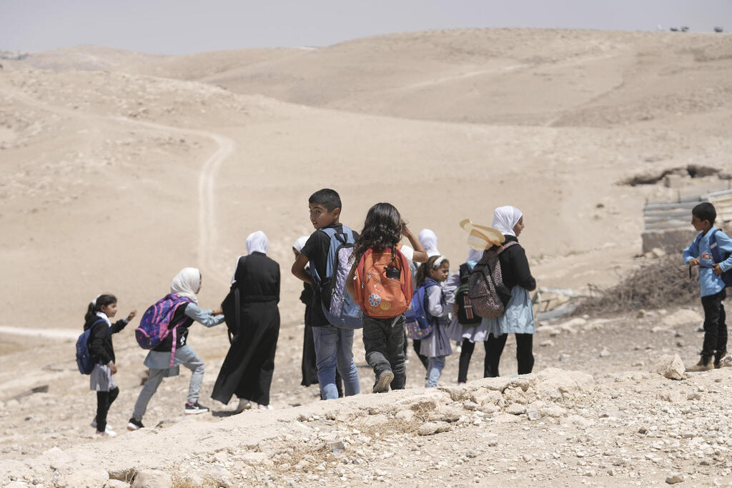 Children walk to school at Masafer Yatta near Hebron 