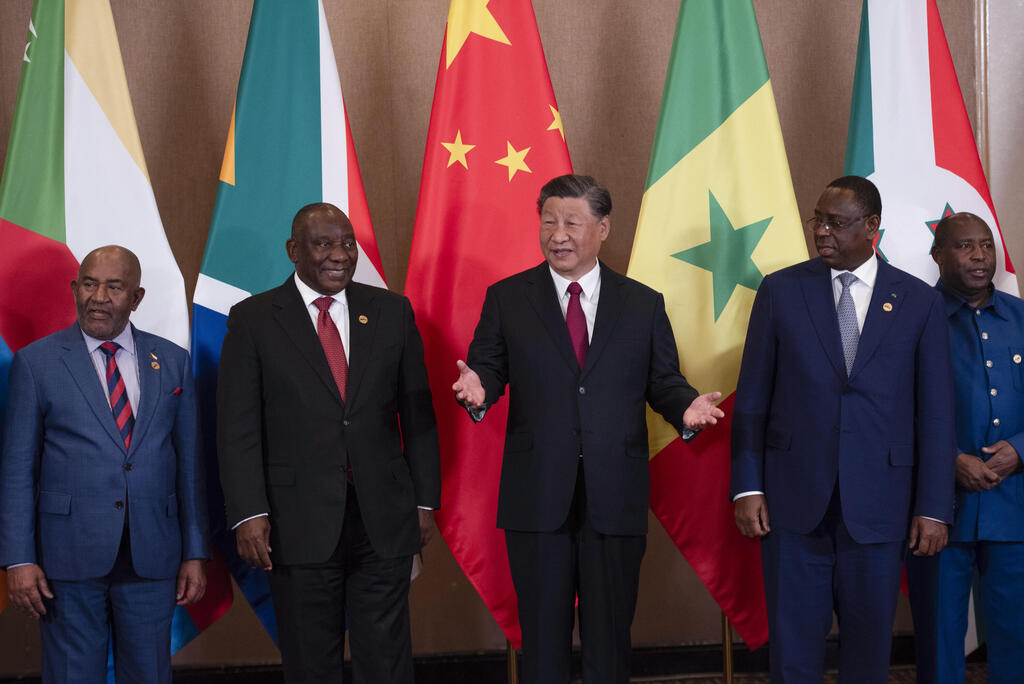 President of China Xi Jinping and South African President Cyril Ramaphosa attend the China-Africa Leaders' Roundtable during the BRICS Summit 